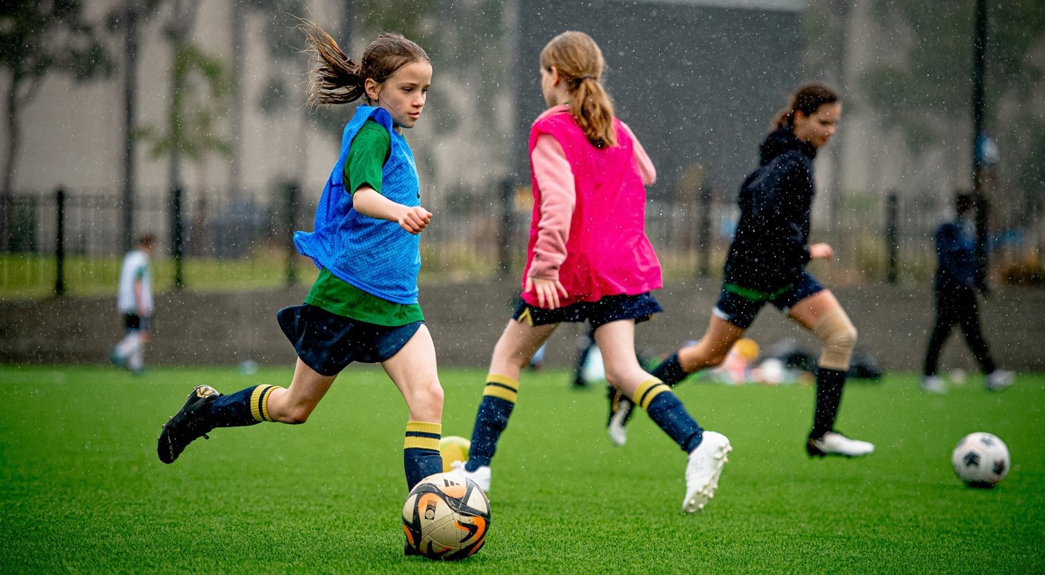 Go Camps Young Girls Playing Football