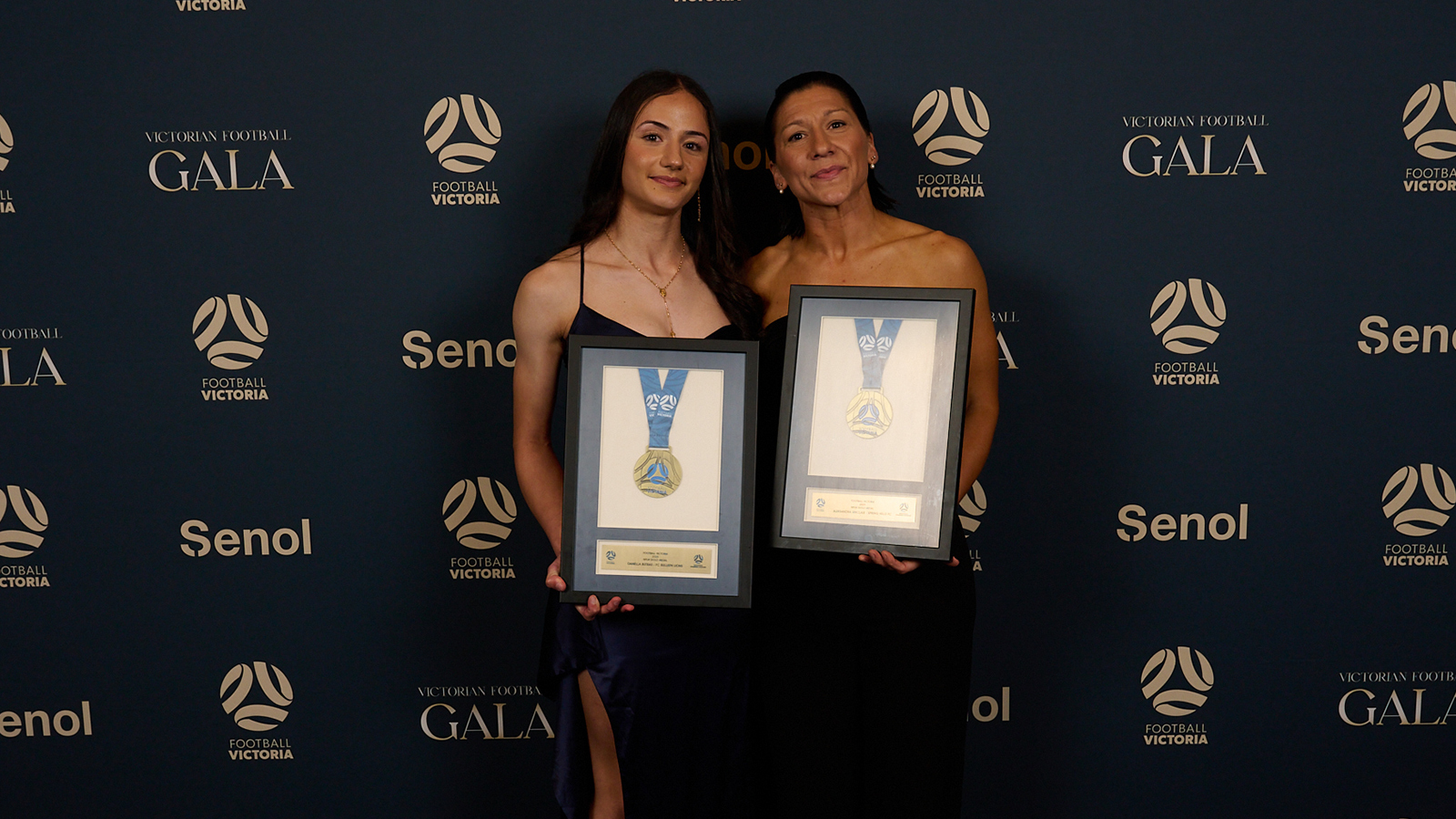 Danella Butrus and Aleksandra Sinclair pose with their 2025 NPLW Gold Medals