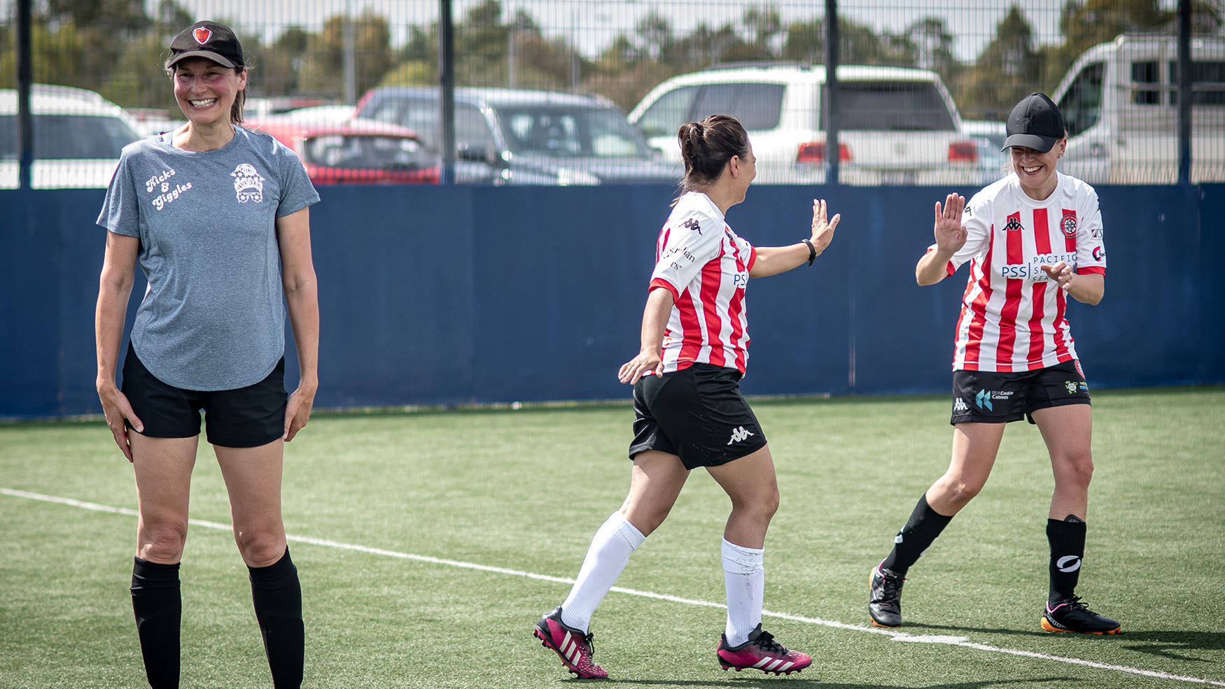 Senior women playing football.