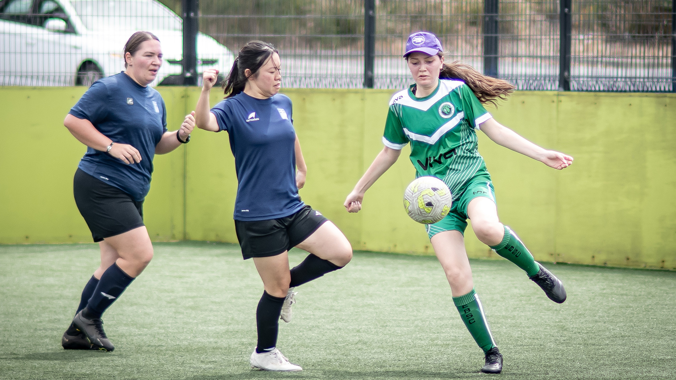 Women playing football at Go Soccer Mum's Cup, now called PlayHer Cup.