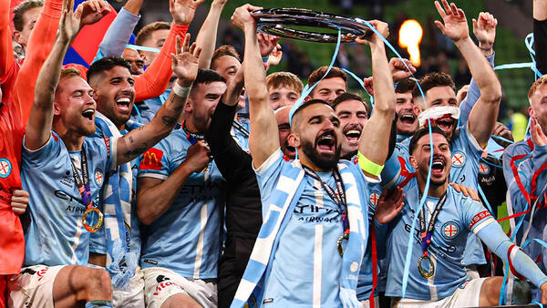 Aziz Behich after the 2025 Grand Final