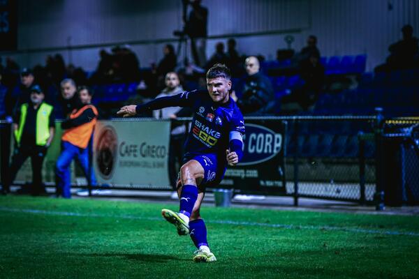 joe guest kicking the ball