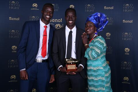 Alou Kuol with family